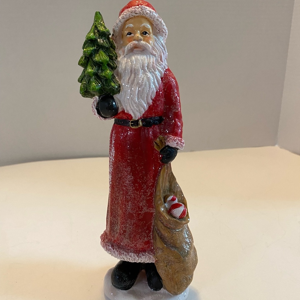 Holiday Home Santa Claus Holding Bag of Toys And Tree Polyresin Figurine